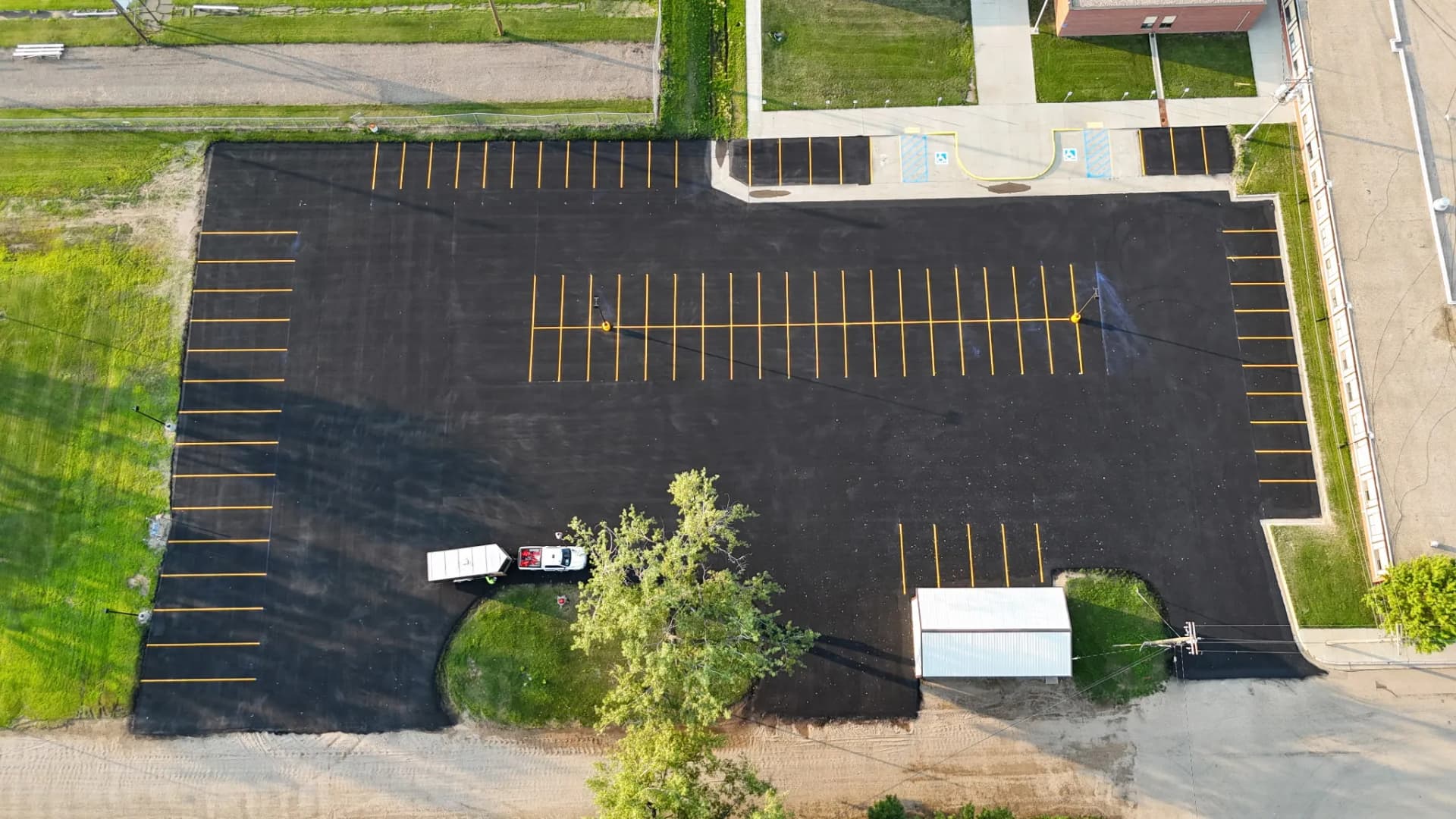 School parking lot sealcoating and line striping in glenburn nd