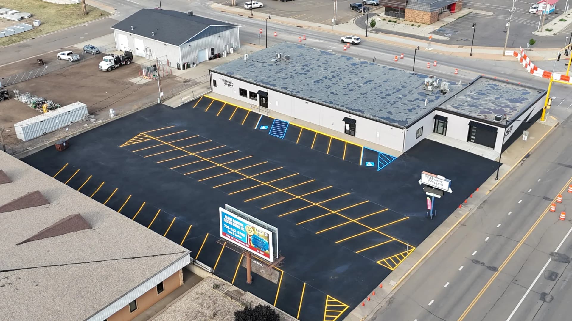 Parking Lot Sealcoat and Striping at Medicine Shop Dickinson